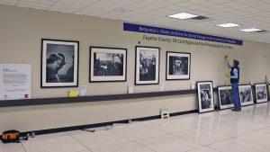 Installation of Art Shay civil rights photography by Hooks Institute
